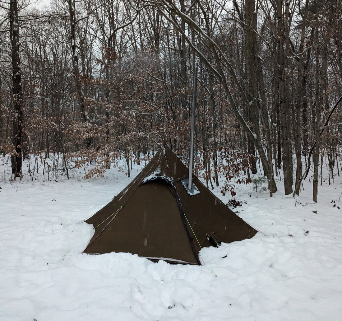 Luxe Outdoor Hexpeak F6E Winter Shelter hot tipi tent in snow