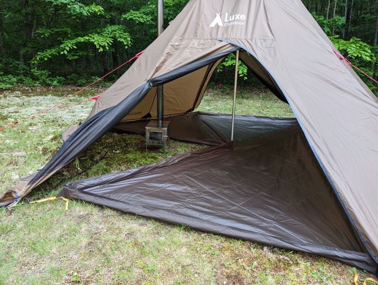 Luxe Megahorn III Footprint with stove, installed in a Megahorn III